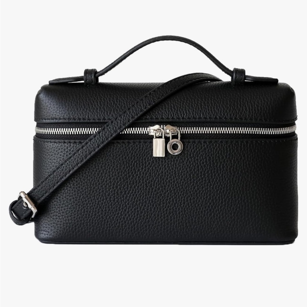 Top handle zip around vegan leather cross body bag with a luxury look silver zip